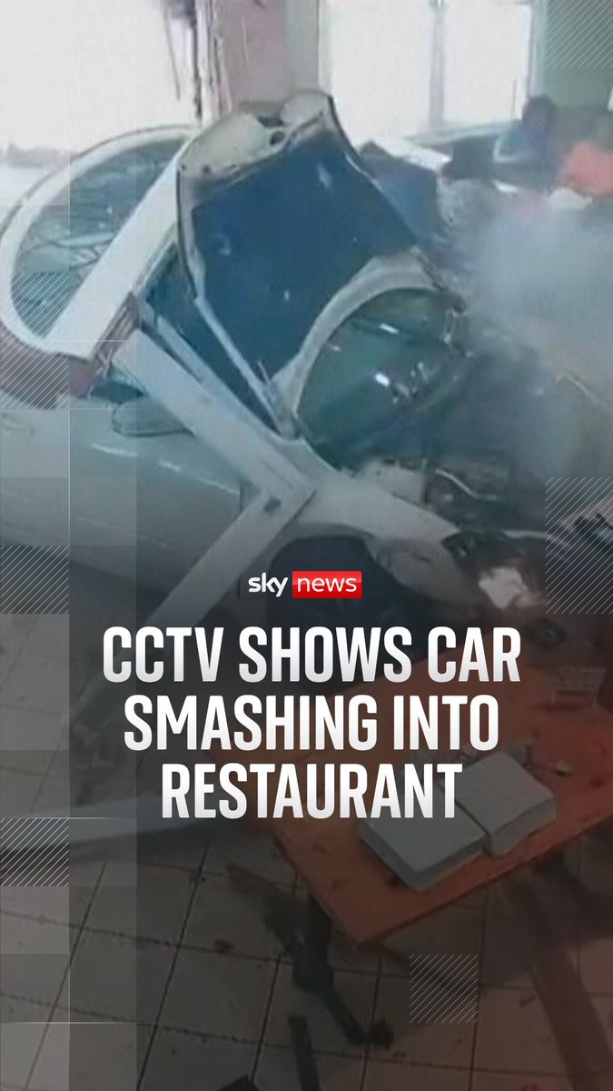 Watch as CCTV footage shows a car smashing into a restaurant - only feet away from customers as they had lunch.