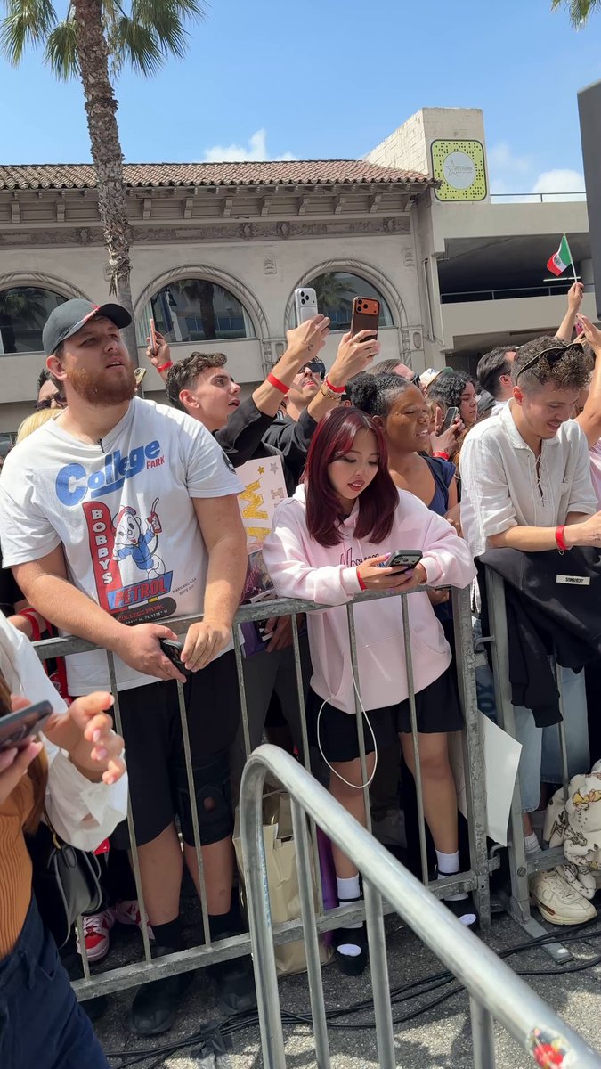 Fans sing "We Can't Stop" outside of #MileyCyrus' Hollywood Walk of Fame ceremony.