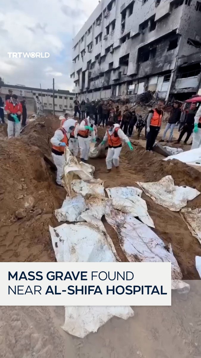 Palestinian Civil Defense crews excavate a mass grave at Al-Shifa Hospital in Gaza City containing at least 30 bodies, as documented on Wednesday, December 10.