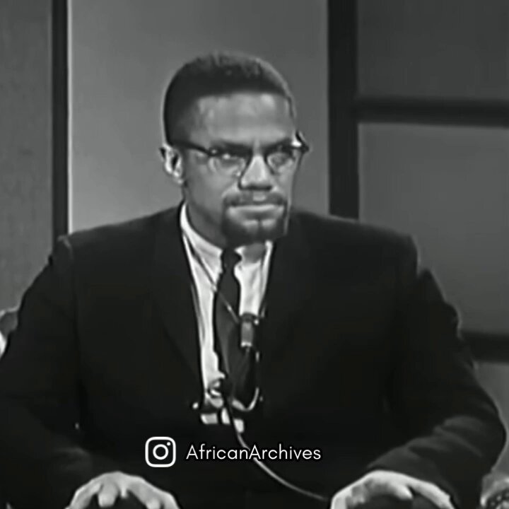 Malcolm X in 1965, weeks before being assassinated.