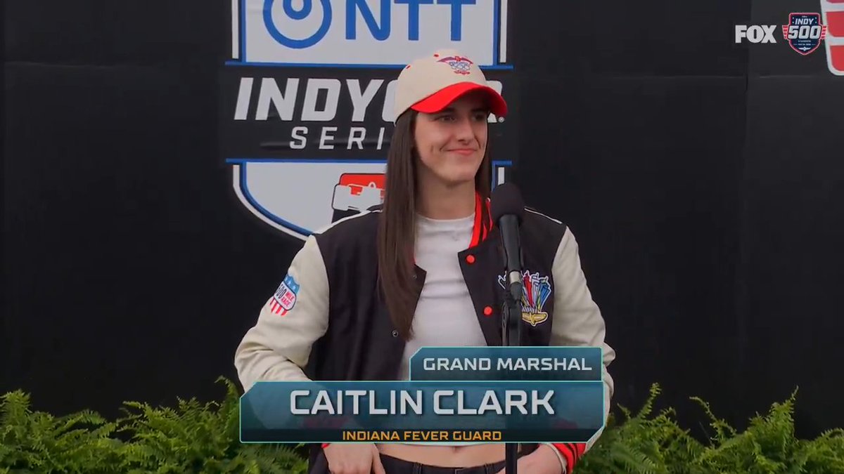 Grand Marshal Caitlin Clark gives the "drivers, to your cars" command!