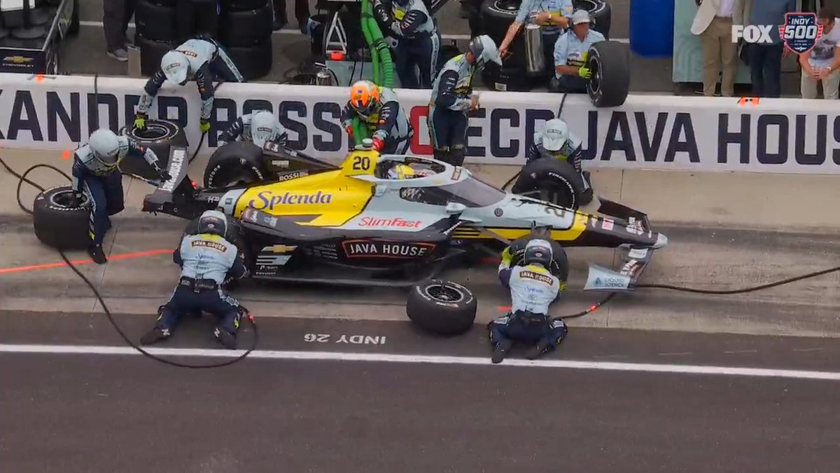 Alexander Rossi loses valuable time on pit road.