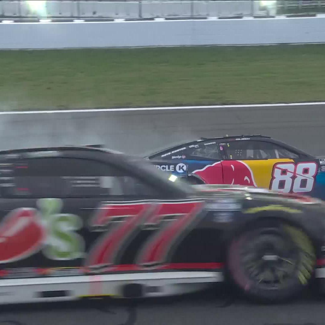 The caution is out after Connor Zilisch collides with a sliding Austin Cindric.