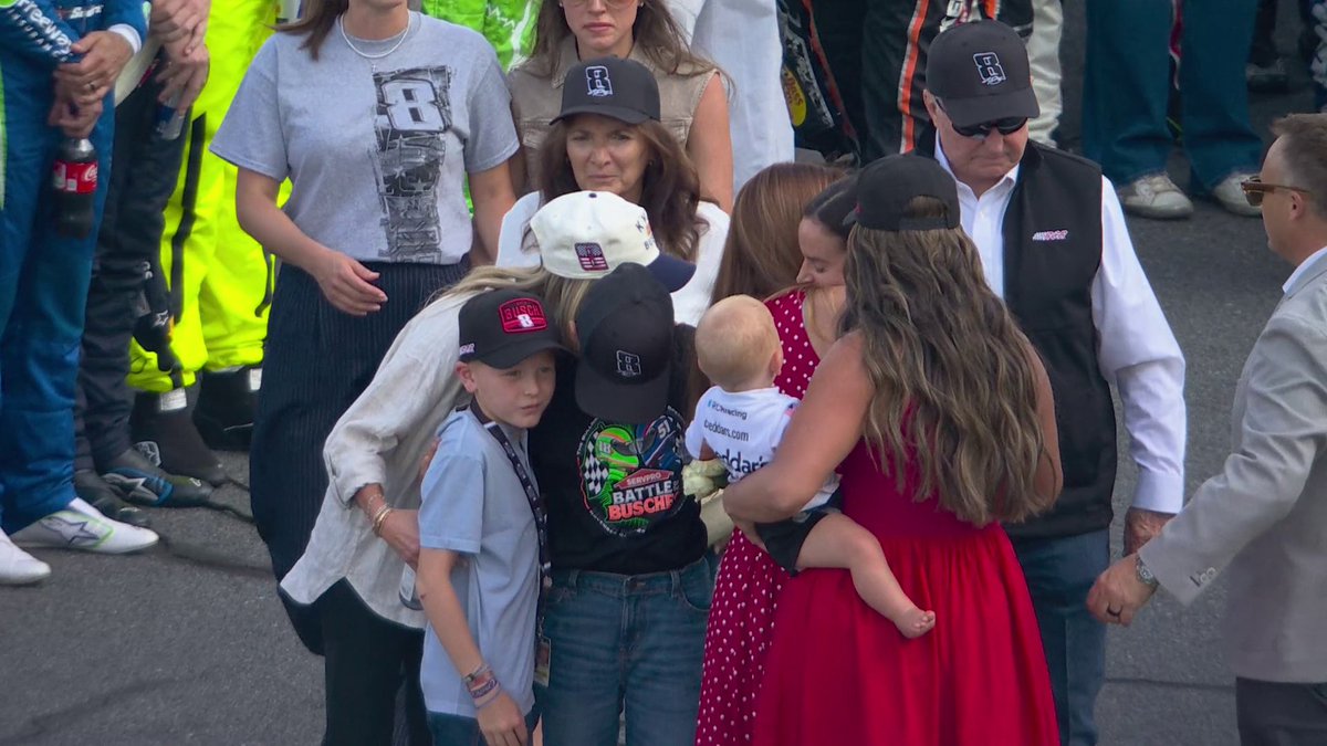Kyle Larson's son Owen walked over to console Brexton Busch before the moment of silence.