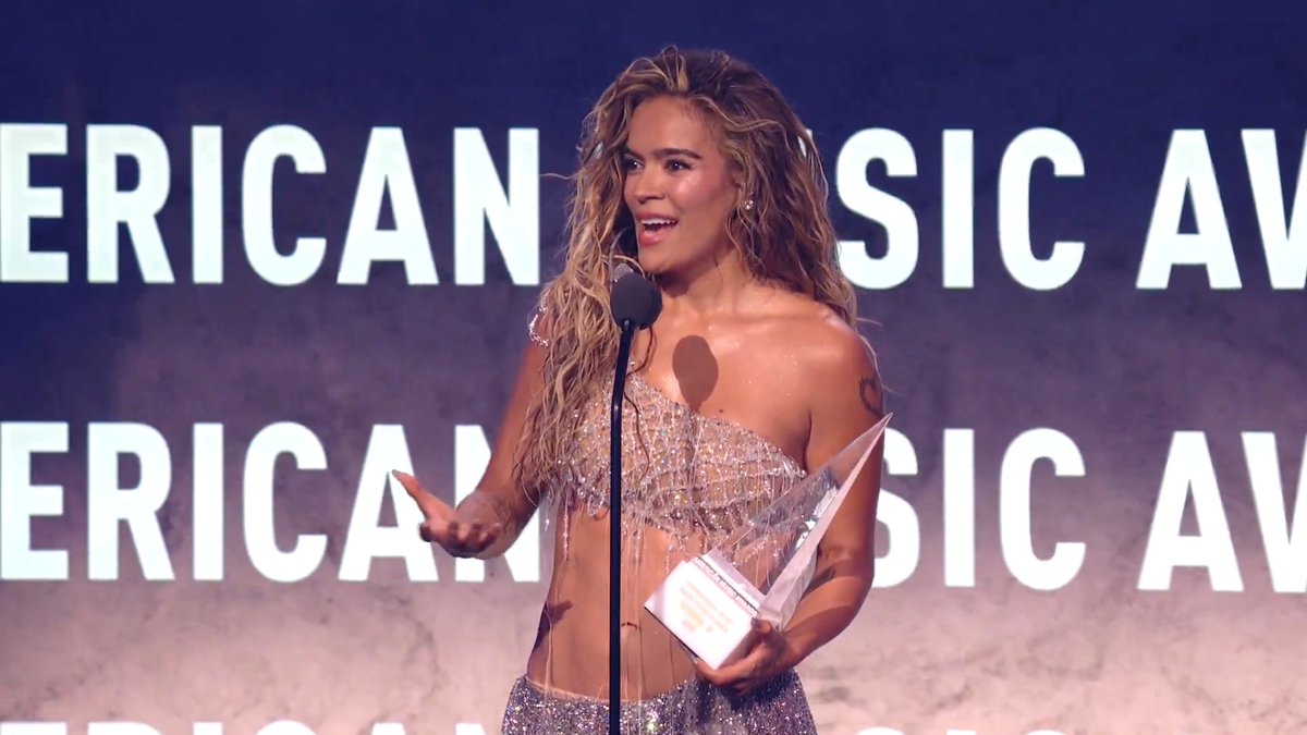 Thank you for giving the world your music, @KarolG 🫶 Congrats on receiving the International Artist Award of Excellence! #AMAs