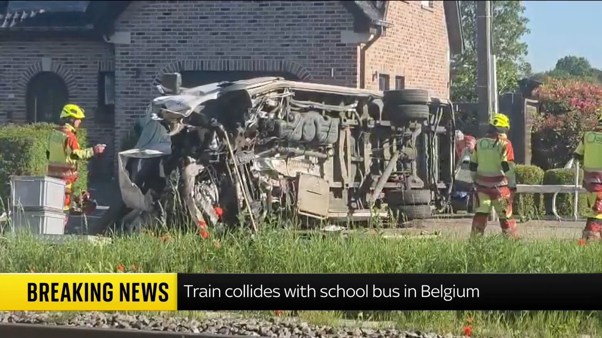 BREAKING: Footage shows emergency services at the scene after a train collided with a school bus in Buggenhout, Belgium Live updates: 📺 Sky 501, Virgin 602, Freeview 233 and YouTube