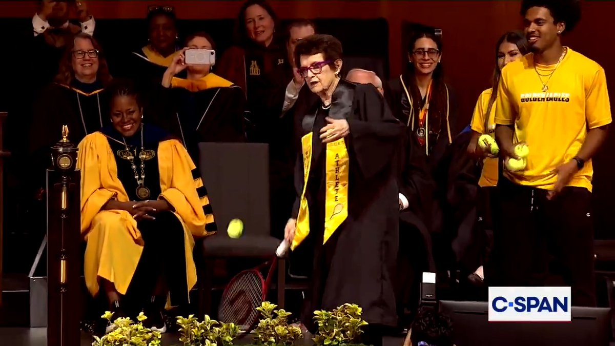 .Billie Jean King hits signed tennis balls to graduates of California State University, Los Angeles (Cal State LA):