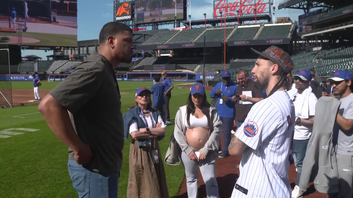 The Knicks' Jose Alvarado talks with Dellin Betances at Citi Field