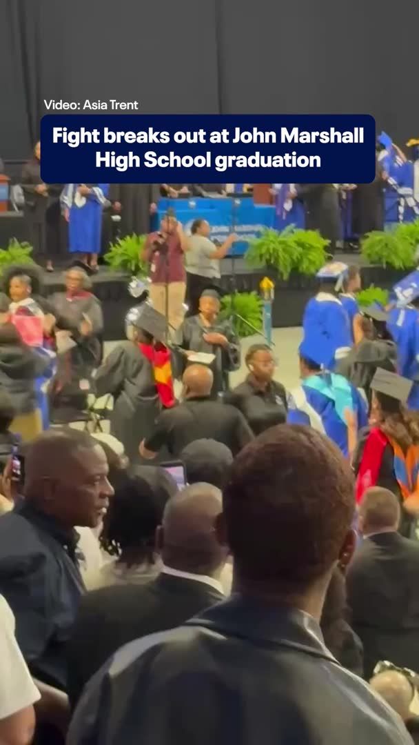 Caught on camera: Fight breaks out during graduation ceremony at John Marshall High School.
