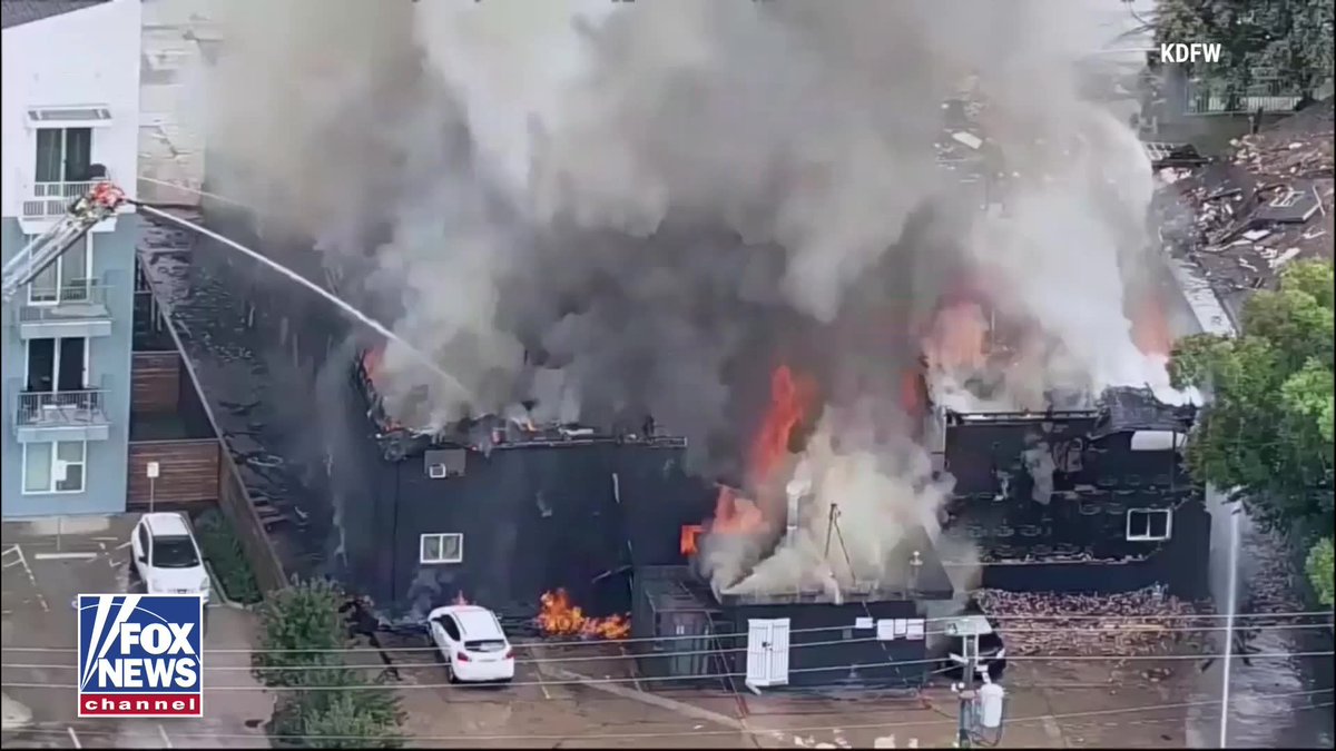 A massive explosion and fire ripped through an apartment building in Dallas, sending heavy flames and smoke into the air and injuring at least four people. Nearly 100 firefighters rushed to the scene in the city’s Oak Cliff neighborhood. It's not clear how many people were in the building at the time.