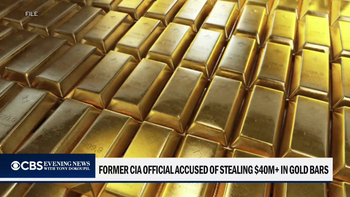 A former CIA official was arrested and charged with stealing public money after FBI agents allegedly found $40 million worth of gold bars at his home while investigating whether he lied about his educational and military background.
