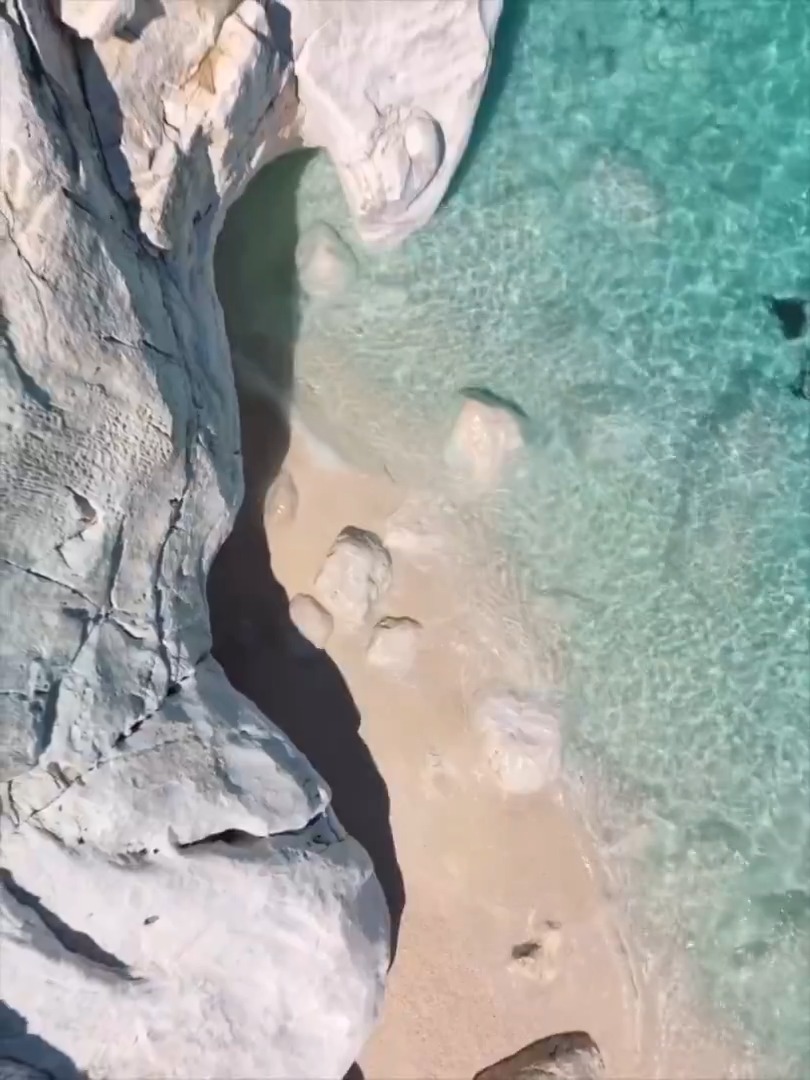 Heaven on Earth 🌊 Crystal coves, dramatic cliffs, and that impossible turquoise water. Moments from Costa di Baunei, Sardinia.