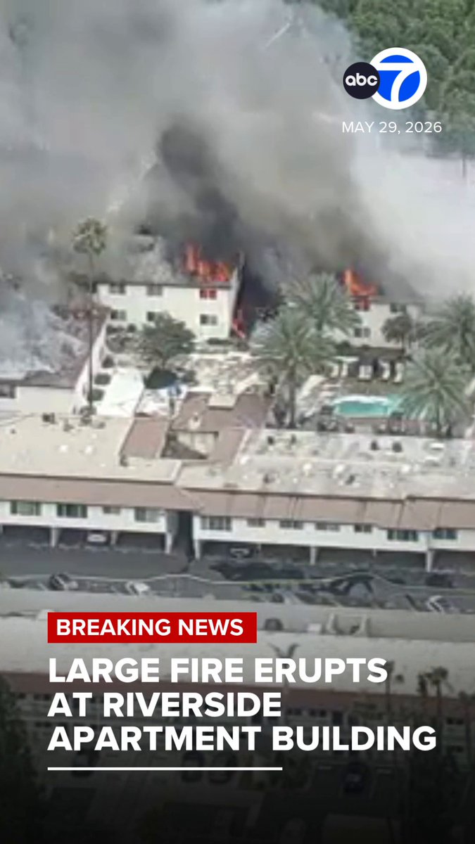 #BREAKINGNEWS: A large fire broke out at an apartment complex in Riverside on Friday, forcing the evacuation of two buildings and sending up a thick plume of smoke. AIR7 was over the scene as raging flames shot through the roof of the structure.