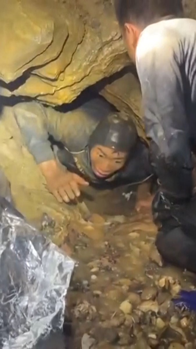 Rescue divers in Laos on Friday night safely evacuated the first of five local villagers who had been trapped in a cave for more than a week. The villagers had reportedly entered the cave to look for valuable minerals before being trapped by flash flooding. One other villager escaped in time and alerted the authorities to the seven left behind.