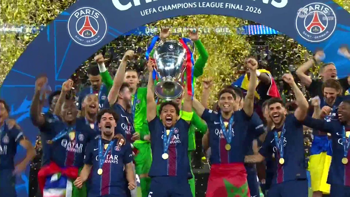 Marquinhos mimicking Ronaldo while lifting the UCL trophy