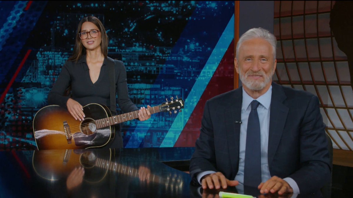 .o l i v i a missed Colbert's goodbye, so she gives a heartfelt sendoff to Jon instead