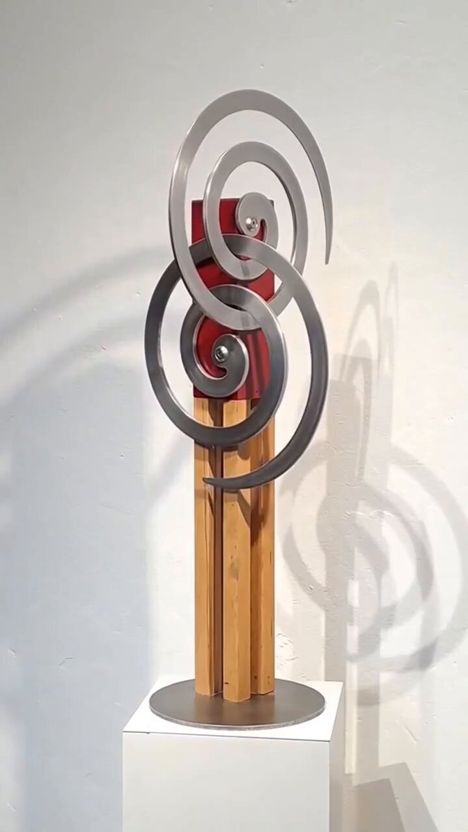 Kinetic sculpture titled "Two Spirals" created in 2021 by German artist Felix Scharstein