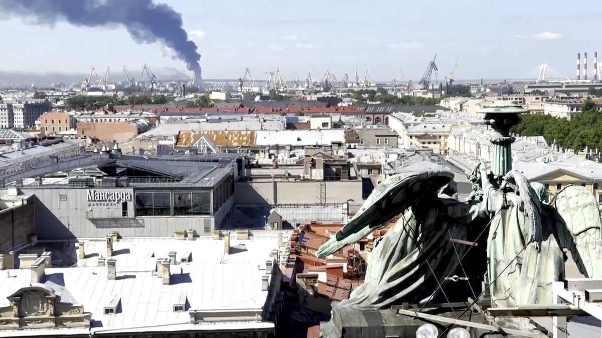 Ukrainian drones hit an oil terminal in St Petersburg and a warship in dry-dock at a nearby naval base, hours before Vladimir Putin's showcase economic forum got under way in the city, in a clear attempt to embarrass the Kremlin chief