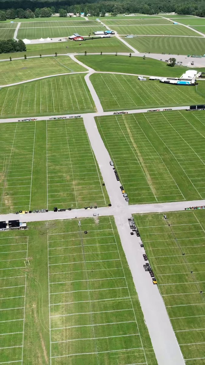 Took a little flight over The Farm yesterday with Bonnaroo just a week away. And here’s what I saw: a whole lot of green grass, That Tent’s new home, and more than a mile of newly paved + graveled roads and pathways stretching across the site. 🦉