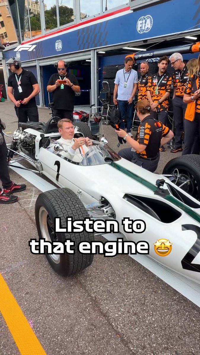 Volume UP... 🔊 Mika Hakkinen starts up the McLaren M2B in the pit lane on Thursday, to the surprise of Lando Norris! 😅 #F1 #MonacoGP