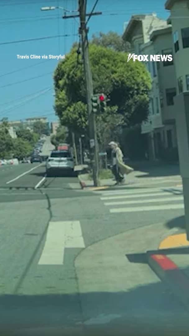 Dashcam video shows a three-wheeled buggy slam into a black Audi in San Francisco — launching the driver into the street as stunned pedestrians look on. Police say four people suffered minor to moderate injuries after the Arcimoto FUV t-boned the vehicle near Baker and Hayes Street. The crash remains under investigation by the San Francisco Police Department.