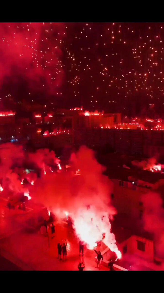 Late-night football celebrations in Algeria mark the crowning of local club MC Alger as national champions, alongside massive excitement for the national team.