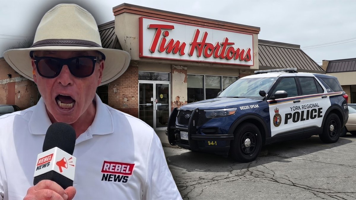 Shooting the messenger? Rebel News reporter BANNED FOR LIFE from visiting Tim Hortons! Just when you think you’ve seen everything, along comes a story about a double-double turning into double trouble… You may recall our recent reports regarding Tim Hortons. We exposed the company for lying through its teeth at a recent presser. Tim Hortons said they were going to go back to hiring Canadian citizens. That would be great news if only it were true. That’s because Tim’s is STILL making use of the Temporary Foreign Worker Program! Check out the federal government’s job board. Tim’s currently has about 90 positions available under the Temporary Foreign Worker Program. Sure, Tim Hortons loves selling its wares to Canadians. As for hiring Canadians? Nah. Not so much… But get this: we discovered Tim Hortons has a very thin skin. Because when the executives at Canada’s biggest foodservice company saw our reports, they blew a fuse! You see, Tim’s is used to getting positive press from the mainstream media. Tim’s is one of the largest advertisers in Canada. This company has a cozy business arrangement with the trained seals in the mainstream media. And it boils down to this: report nice stuff about Tim’s, and Tim’s will cut some big cheques for ads. Quid pro quo. But unlike the mainstream media, Rebel News is not domesticated. We don’t bend the knee to this company or any other company. And so it was that Tim’s decided to play hardball. Which is to say, the company was so infuriated with our reporting that Rebel News was sent a legal letter. Here’s the skinny: for practicing unauthorized and unapproved journalism, I am now BANNED FOR LIFE from going to any Tim Hortons store in Canada! We’re not making this up! Here’s an excerpt from that letter: “David Menzies, due to past behaviour, is not, for any reason, permitted access to the premises, including parking lots, landscaped areas, and drive-thrus of any Tim Hortons restaurant in Canada, any and all manufacturing and distribution facilities owned or operated by TDL across Canada and the Tim Hortons offices in Montreal, Calgary and Toronto.” The letter is signed by a Mr. Tim Bit. (OK, we made up that last part. But the truth is, we don’t know who signed the letter because we can’t read the signature. But it sure looks like “Tim Bit” to us…) But seriously, such a cruel punishment, eh? You see, I can no longer purchase an inedible edible that tastes like a piece of rancid cardboard. I cannot venture into a bathroom that resembles a public beach in Mumbai, India. I can no longer gaze upon a baked goods display case overrun by insects. Oh, say it ain’t so! Gee, what other “delights” can I look forward to being banned from? Going for a scenic drive in Kapuskasing during a winter blizzard? Being denied floor seats at a Yoko Ono concert? Oh, the humanity…! Don’t worry, Tim’s. I promise to stay out of your filthy restaurants and never again consume your garbage cuisine. Besides, in the months ahead, some 700 Dunkin’ Donuts are going to open in Canada. We can’t wait! But get this: even me being on a public sidewalk near a Tim Hortons is unacceptable to the Tim Wits. That’s what we found out last Thursday when we returned to the Aurora Tim’s. Myself and cameraman Lincoln Jay obeyed the legal letter and recorded a follow-up video from the sidewalk along Wellington Street East. Alas, the mere sight of Rebel News staffers – even from afar – had the owner frothing mad. He actually called the cops! And incredibly, THREE York Regional Police cruisers rushed to the scene of the non-crime. They lingered there for more than an hour. Why? Who knows? Oh, just to put things in perspective, York Region is in the midst of its worst crime wave ever. And this is what law enforcement squanders its resources on? Unbelievable… So, in the final analysis, what have we learned about Tim Hortons? Firstly, this company is run by a bunch of traitors. Tim Hortons, which grossly wraps itself in the Maple Leaf, prefers to hire noncitizens over Canadians. Because this multi-billion dollar company is all about the bottom line and it will use any nickel-and-dime strategy to boost profits. Ethics mean nothing to this company. Secondly, Tim Hortons is run by bullies. We caught them in a blatant lie. And we called them out. And for the utter temerity of reporting the truth, they threaten me with arrest? These are Banana Republic garbage tactics. How sad. We think of the late great hockey player for whom this company is named. That Tim Horton must be rolling in his grave right now. REPORT by David Menzies:
