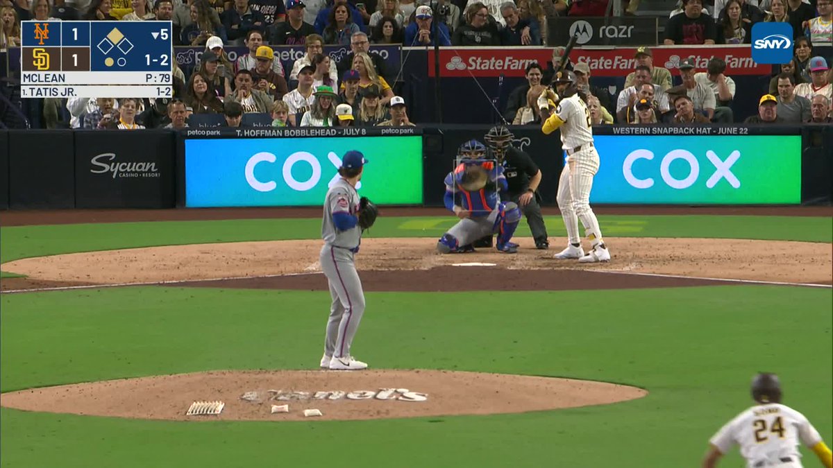 Bo Bichette was shaken up after diving for Fernando Tatis Jr.'s ground ball. Bichette is staying in the game at shortstop after a visit from Carlos Mendoza and a Mets trainer