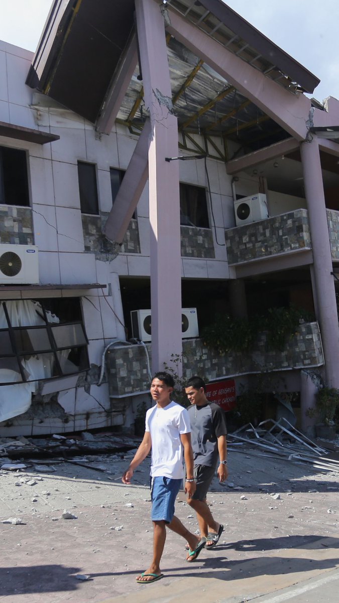 Rescuers searched ruined buildings in the southern Philippines on Tuesday to ensure no one was still trapped a day after one of the strongest earthquakes to hit the country in a half-century killed at least 37 people and displaced over 20,000.