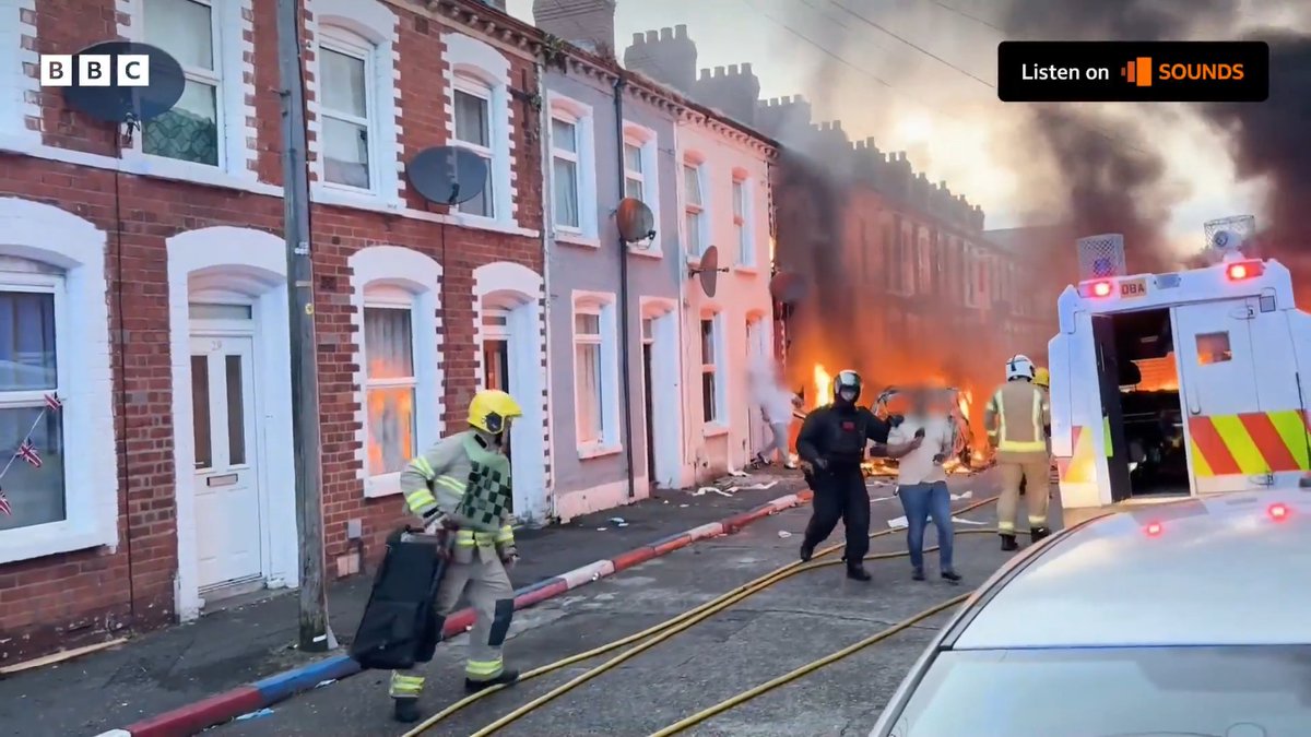 A family flees their home in the back of a police landrover as a house burns in East Belfast More on Nolan now