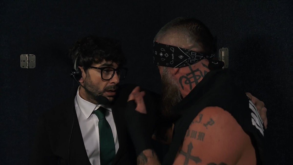 Mark Briscoe is seen talking to Tony Khan backstage. Tony tells him he's got a good solution. World title match approved against MJF?
