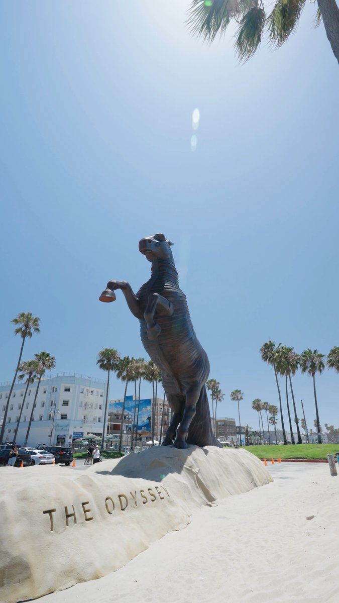 A Trojan Horse on the shores of Venice Beach, CA. Where will it appear next? Experience The Odyssey in theaters 07.17.26.