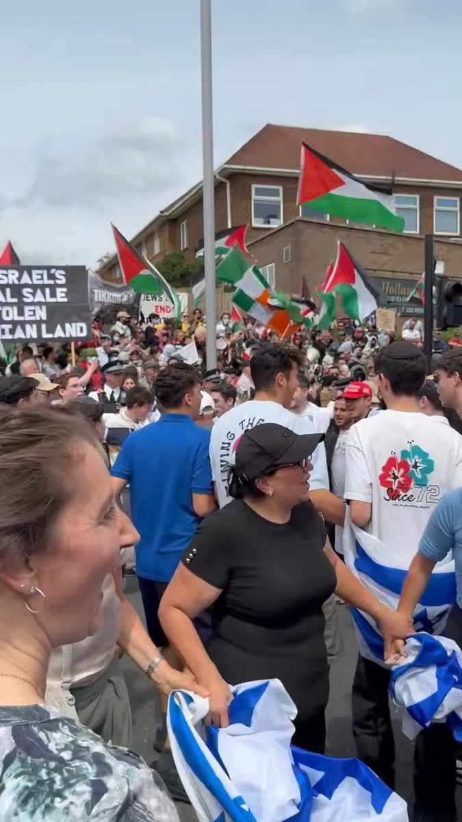 British Jews in Edgeware, London today, joyfully dancing next to the hateful crowds who came to protest at a synagogue. We will always love being Jewish 100x more than anyone could hate us for it. Video Credit: Heidi Bachram
