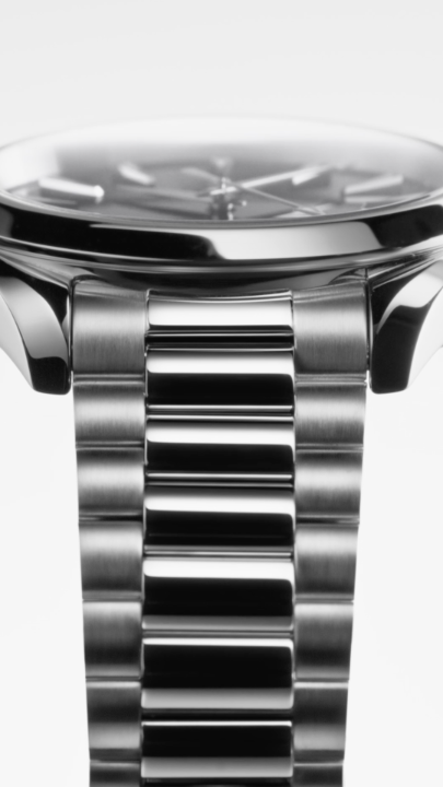 A lacquered black varnish dial, a rhodium-plated logo, an integrated steel bracelet. Classic Seamaster Aqua Terra style in 38 mm. See more. #OMEGA #Seamaster