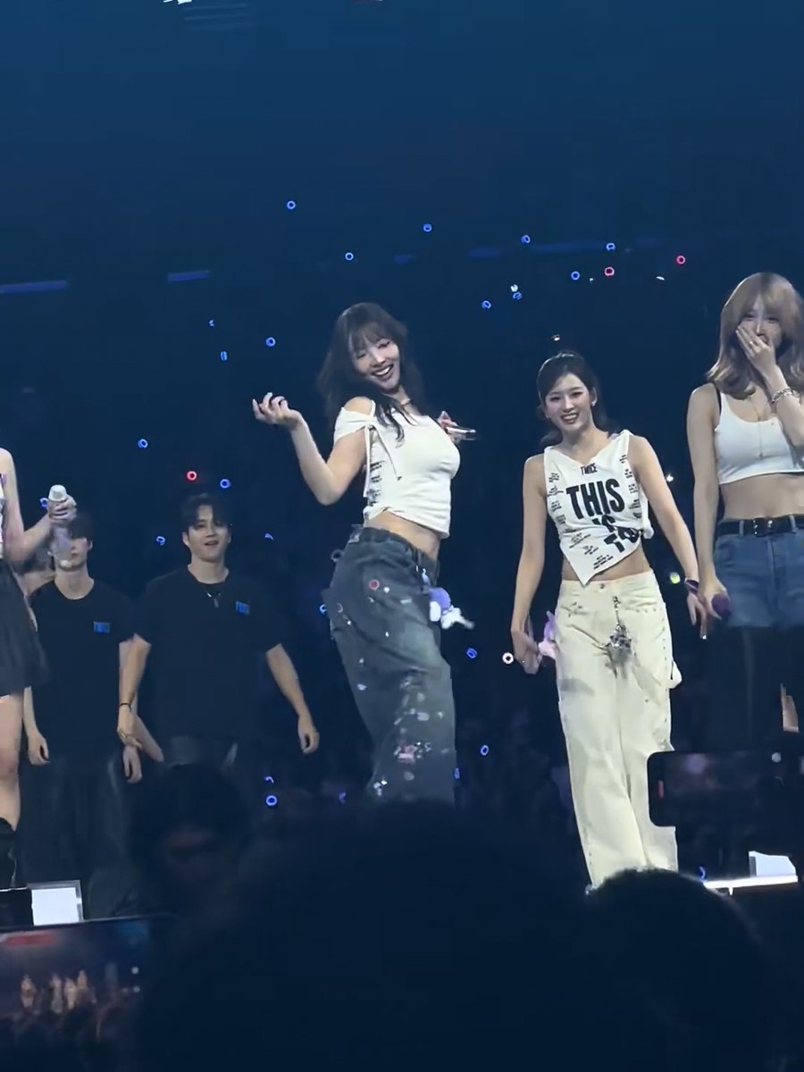 Nayeon and Mina having a twerking battle to Doughnut with a fan while Momo does clock it and scuba
