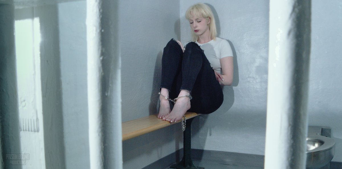 PART 1 of our new series! Prison Bound Productions Serial burglar is finally caught and jailed for her crimes. Here she waits, barefoot, in a holding cell on the night of her arrest. 🚓watch the full video here~: