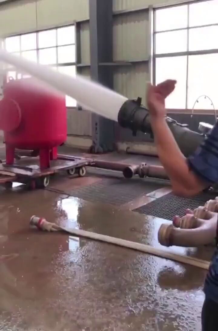 Firefighters use a special hose that turns a water stream into a protective shield [📹 Seth Yuan]