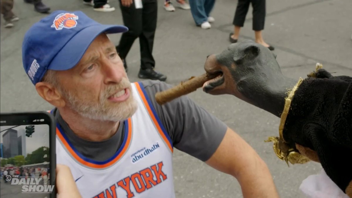 Triumph the Insult Comic Dog went to NYC's Knicks parade to rile up fans, march with the players, heckle Timothée Chalamet, and cross paths with his old pal Jon Stewart @triumphicdhq