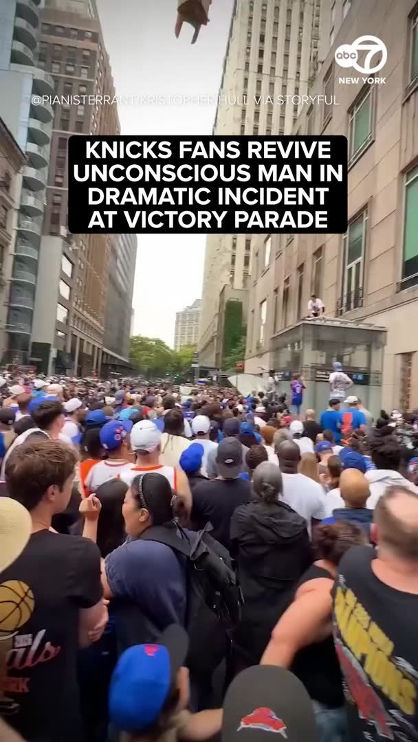 Several people rushed to help and attempted to resuscitate a man who became unconscious during the New York Knicks victory parade in Manhattan on Thursday.