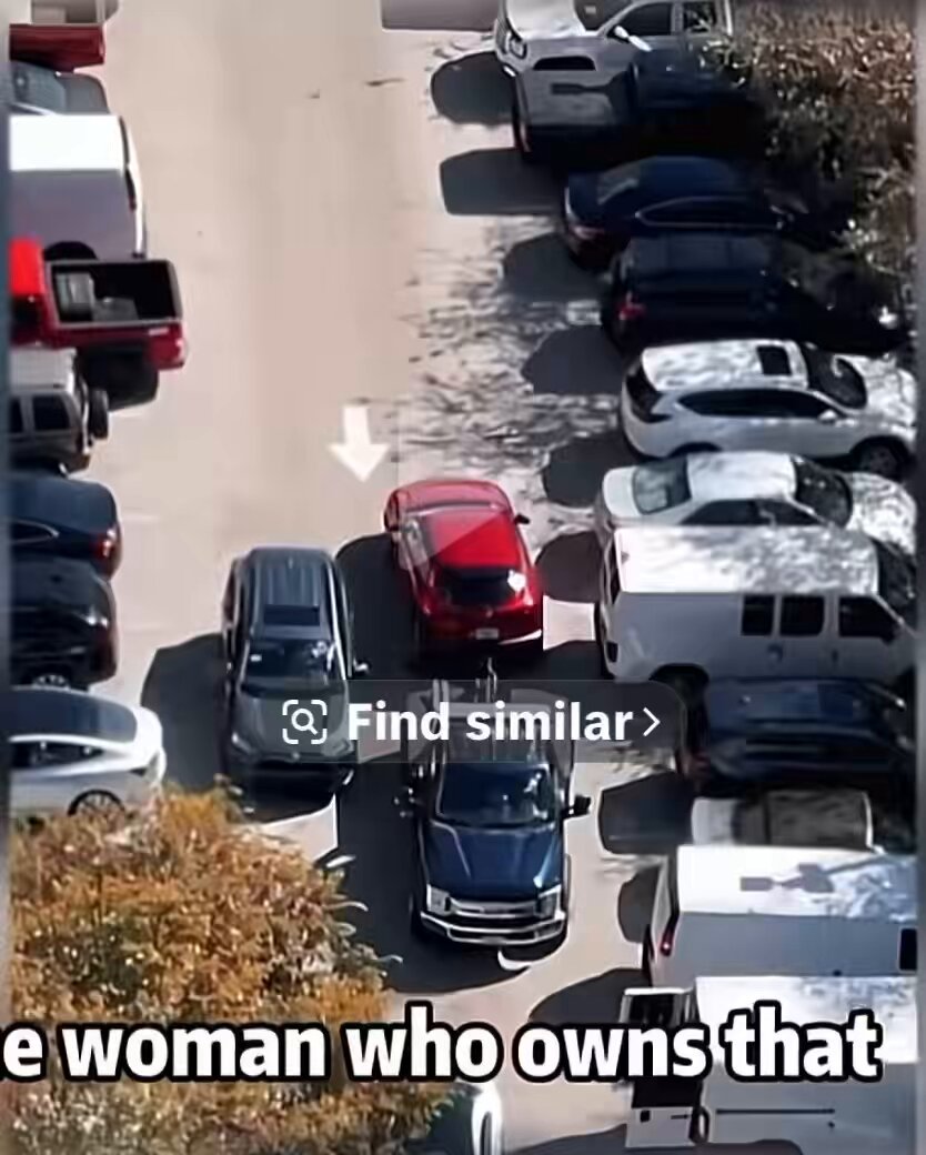 The woman that owns the red SUV watches from her office window as a tow truck pulling her vehicle for being parked illegally stops . The driver gets out and starts rummaging through her car looking in the center console, the glove box, and under her seats . Because she gets this on video she shows the police and they go to his office to handle business . Apparently it’s rare to catch a tow truck operators doing this, but it seems to happen a lot. She just happened to be right place right time .