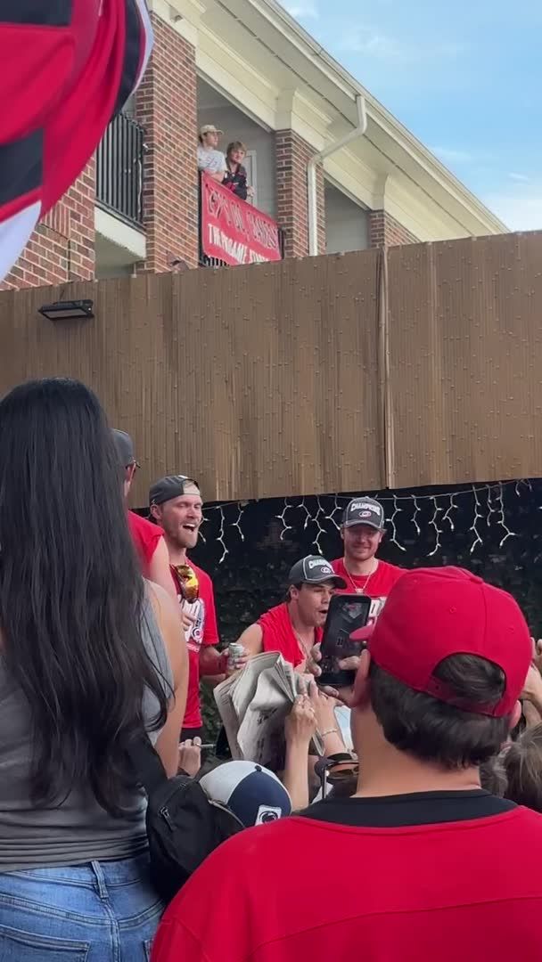 AFTER THE PARADE: Canes players move the party to The Avenue bar in Raleigh.