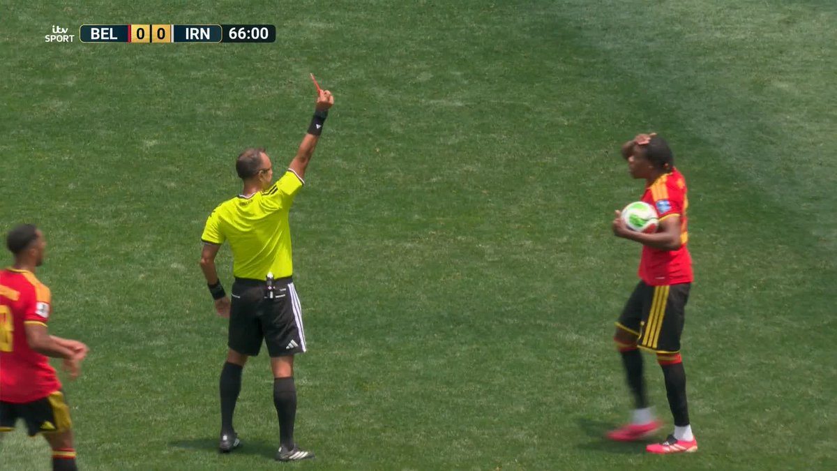 Nathan Ngoy fumbles his back pass, brings down Taremi and Belgium are down to 10 men 🟥