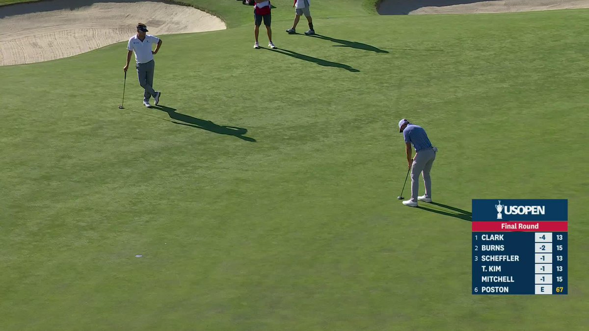 SAM BURNS! ONE BACK! It's a birdie on 16.