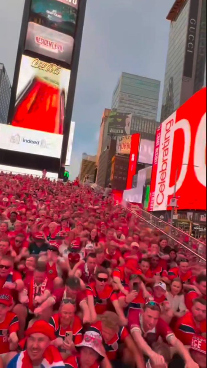 Norway fans do a "Viking Row" in Times Square the day before the Norway vs. Senegal World Cup match.