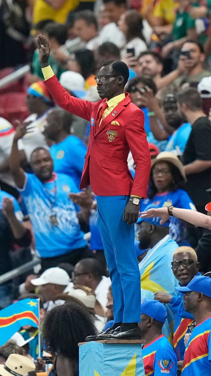 Congo’s famous living statue finally made his World Cup debut on Tuesday. Michel Nkuka Mboladinga, who gained fame during the Africa Cup of Nations for posing as a statue of Congo’s assassinated independence leader Patrice Lumumba for the entirety of games, attended Congo’s 1-0 loss to Colombia. #Congo #FIFAWorldCup #MichelNkukaMboladinga #PatriceLumumba #LumumbaVea
