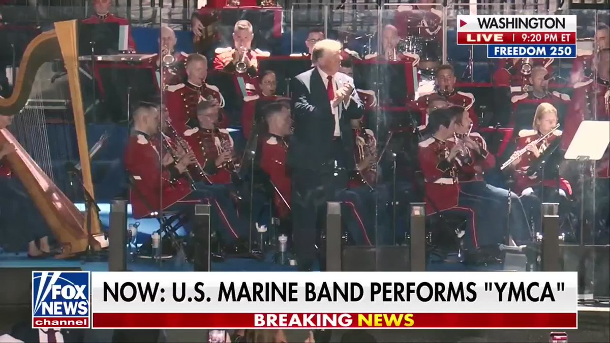 President Trump breaks into his signature dance as the U.S. Marine Band plays "Y.M.C.A." at the conclusion of the Great American State Fair kickoff on the National Mall. The event marked the start of the weeks-long America 250 celebration, honoring the nation's upcoming 250th anniversary with a focus on patriotism, history and national unity.