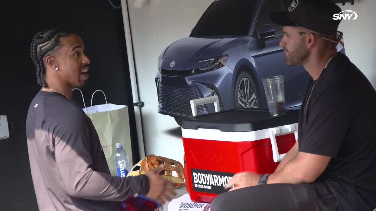 Francisco Lindor talks with J.D. Martinez