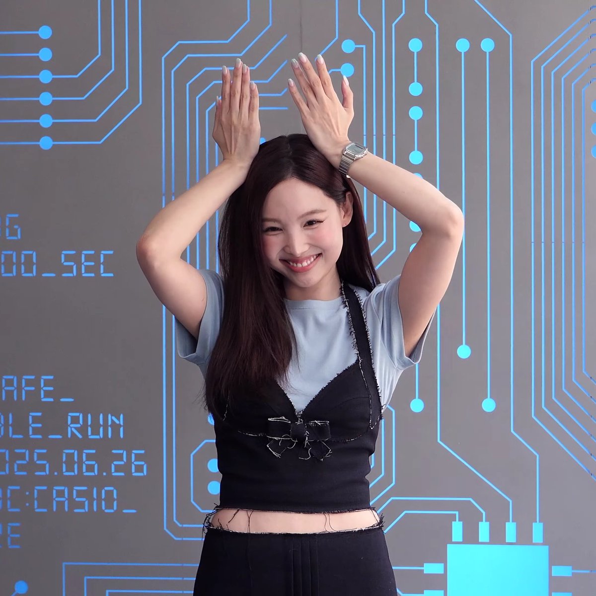 Nayeon changing all the usual poses to show off the CASIO watch including reverse bunny ears 😭