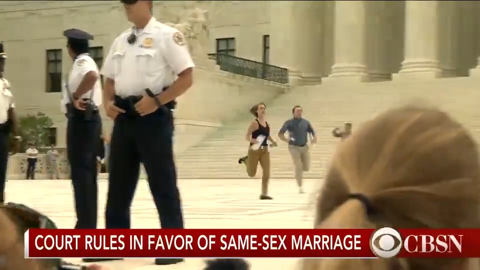 Interns sprint to spread the news that the Supreme Court has legalized same-sex marriage on the day of the Obergefell v. Hodges ruling
