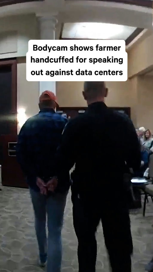 Farmer Darren Blanchard was arrested by cops after speaking for too long at a data center meeting in Claremore, Oklahoma, in February. The city has charged Blanchard with criminal trespass, a crime that carries a $200 penalty. Bodycam footage published by 404 Media shows the moment he was handcuffed.